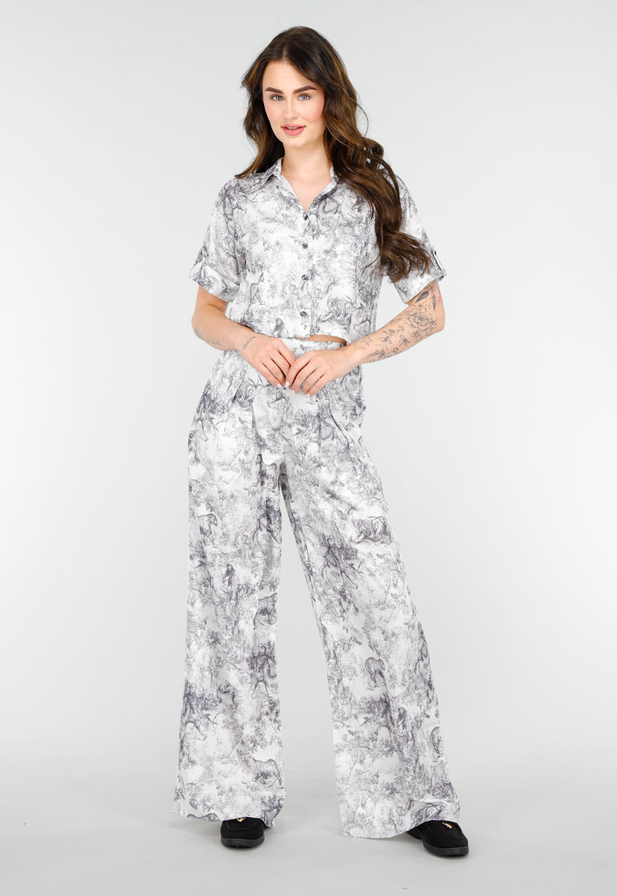 Stijlvolle Set in Zwart-Wit Print met Oversized Blouse en Lange Straight Leg Broek