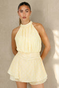 Gele Polkadot Playsuit met Halterhals en Volantlaag