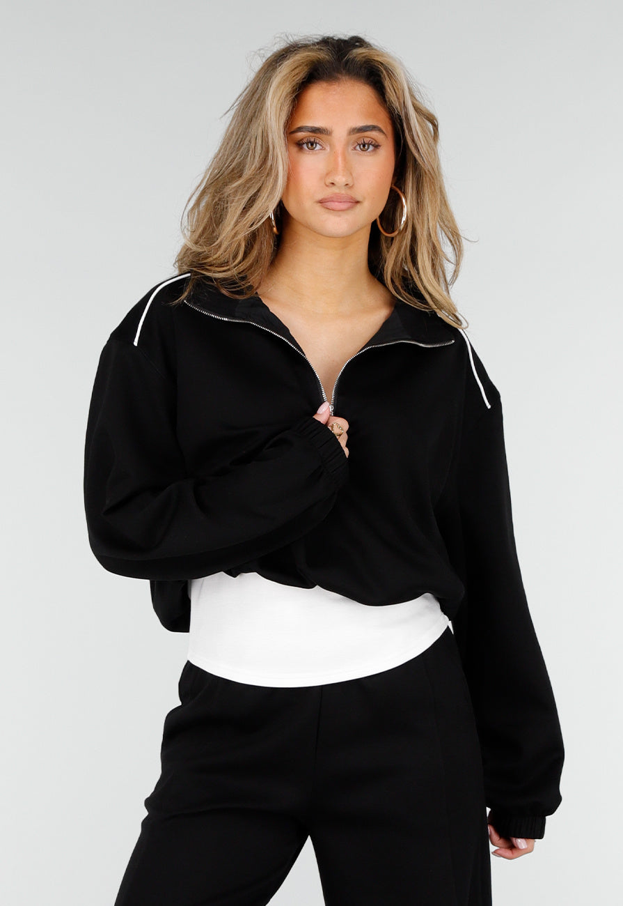 Zwarte Sweater met Halve Rits en Elastische Boorden