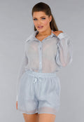 Blauwe Tweedelige Set met Doorschijnende Blouse en Elastische Short
