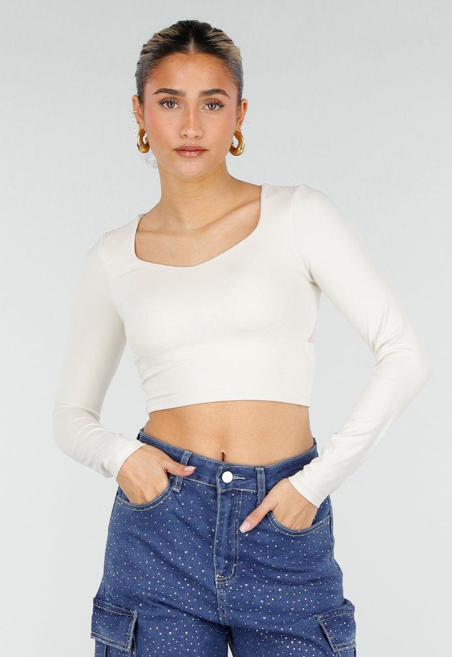 Beige Stretch Crop Top met Lange Mouwen en Pads