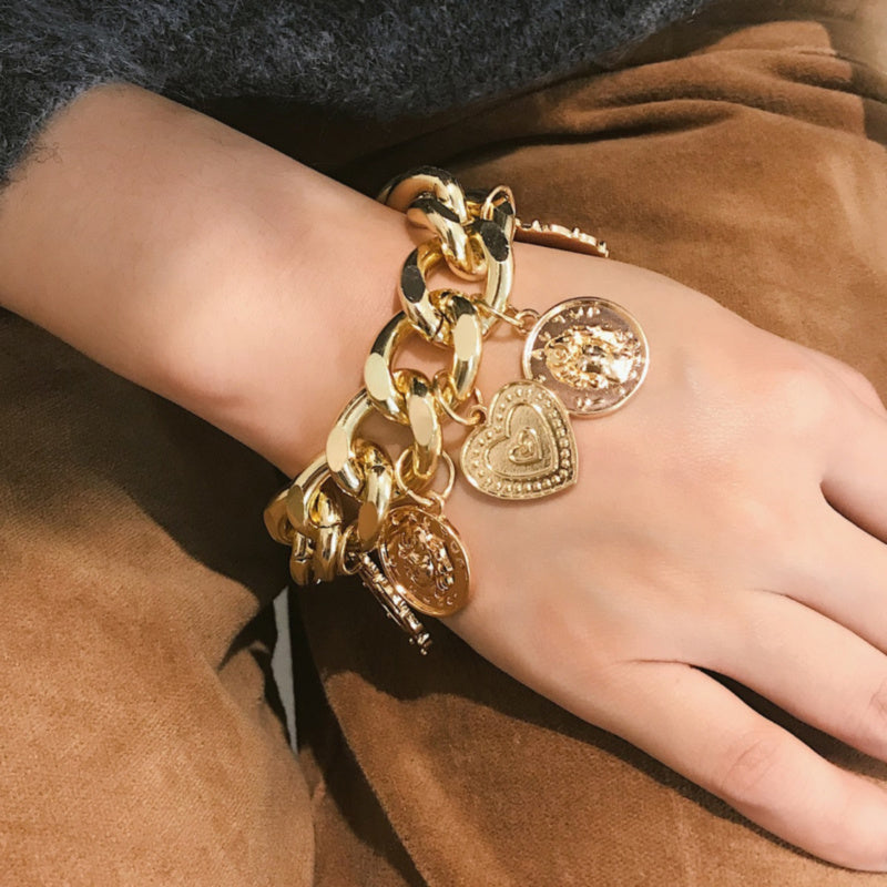 Dikke Goudkleurige Schakelarmband met Munten
