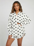Witte Mousseline Two Piece met Zwarte Hartjes en Ruffles